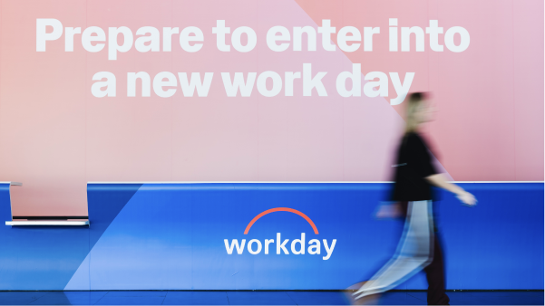 Workday Rising attendees with signs